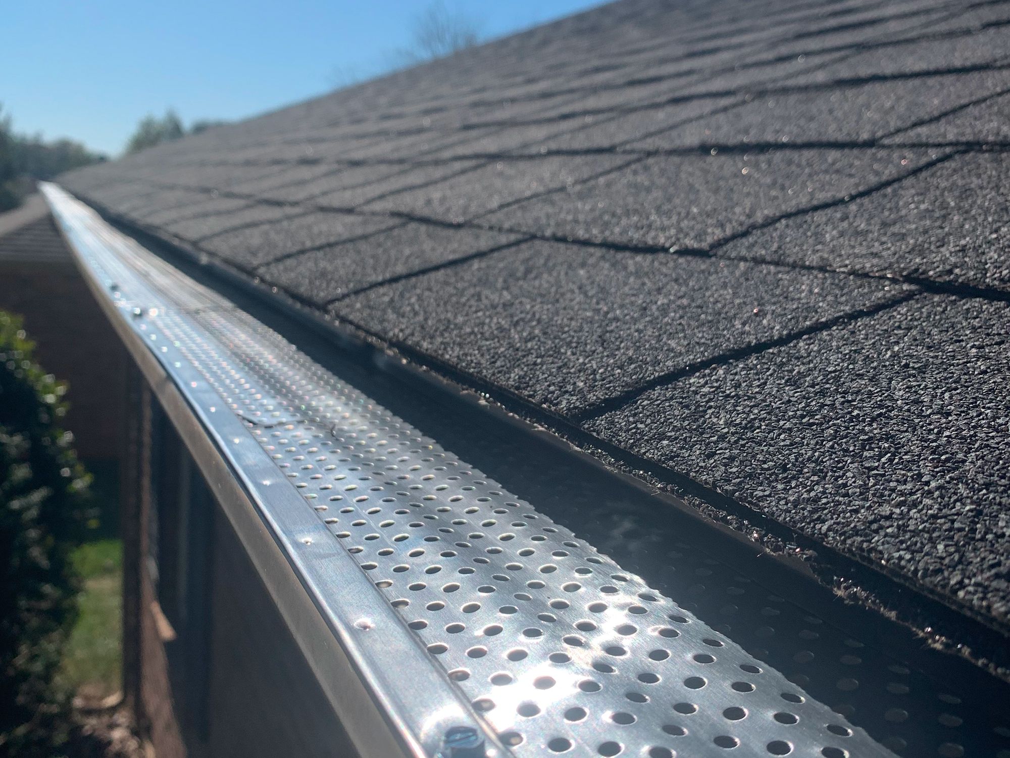 Leaf guard covers installed on gutters